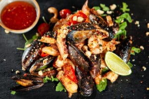 Restaurant Le Grignot - Spécialités françaises de viandes normandes, poisson grillé et fruits de mer dans un décor de vieux bistrot - Plat de fruits de mer
