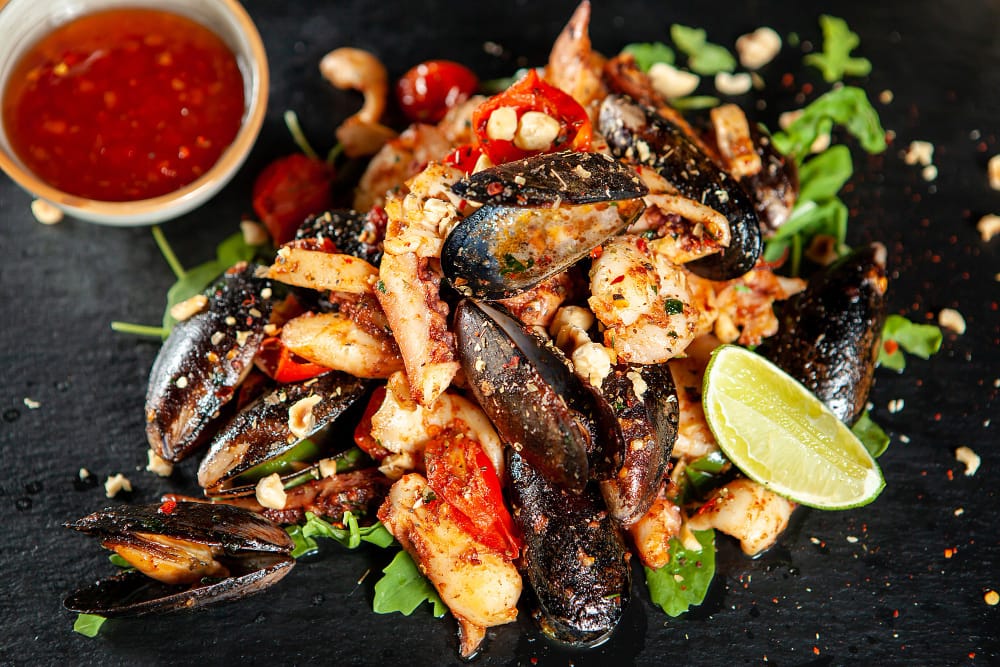 Restaurant Le Grignot - Spécialités françaises de viandes normandes, poisson grillé et fruits de mer dans un décor de vieux bistrot - Plat de fruits de mer