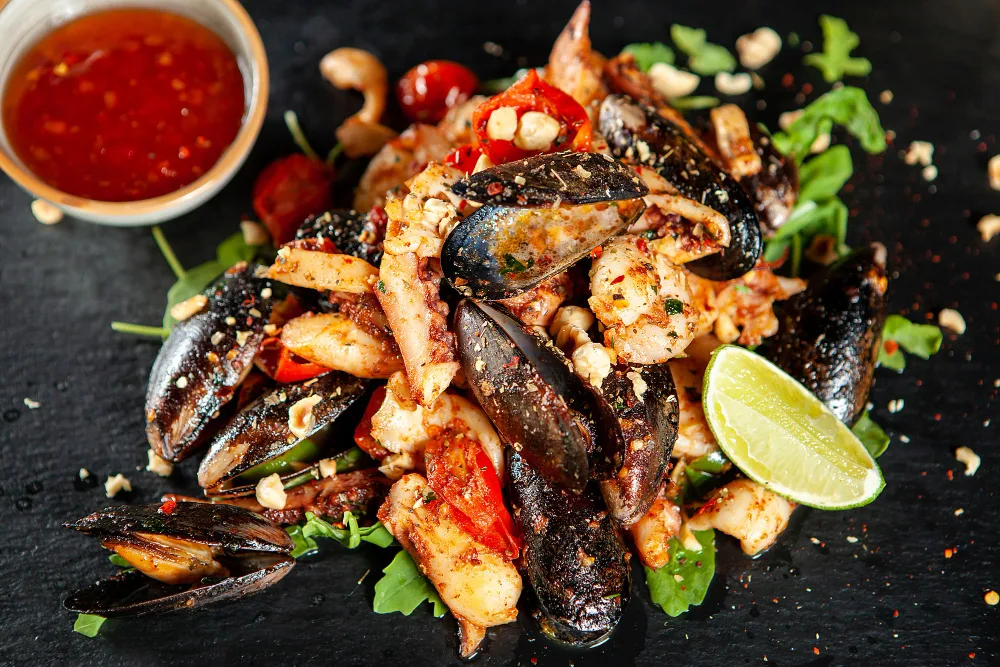 Restaurant Le Grignot - Spécialités françaises de viandes normandes, poisson grillé et fruits de mer dans un décor de vieux bistrot - Plat de fruits de mer